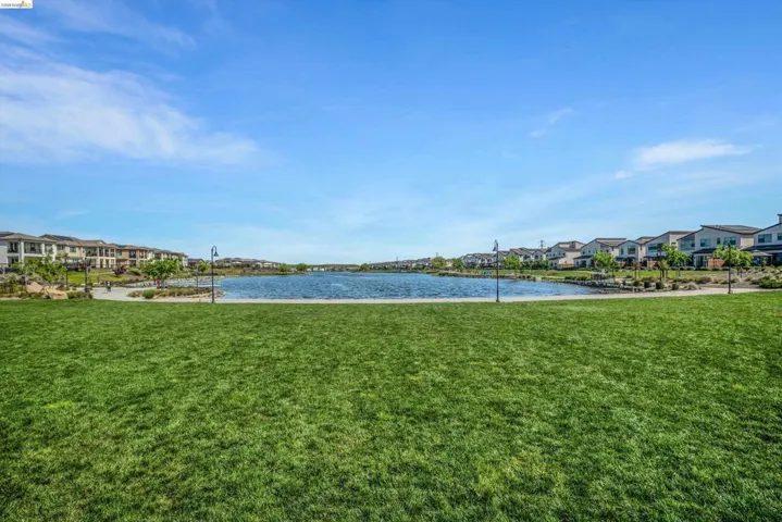 Water view with nearby suburban area