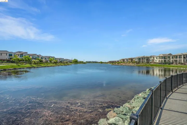 Water view featuring nearby suburban area