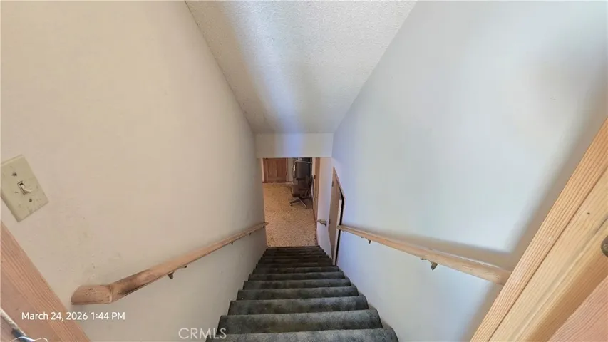 Down the stairs to lower level