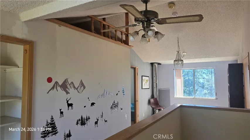 small loft room off hallway
