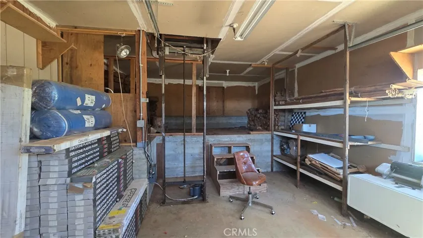 Garage #1 & firewood elevator to main level