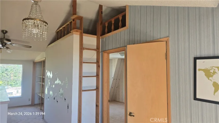 stairs to loft in hall