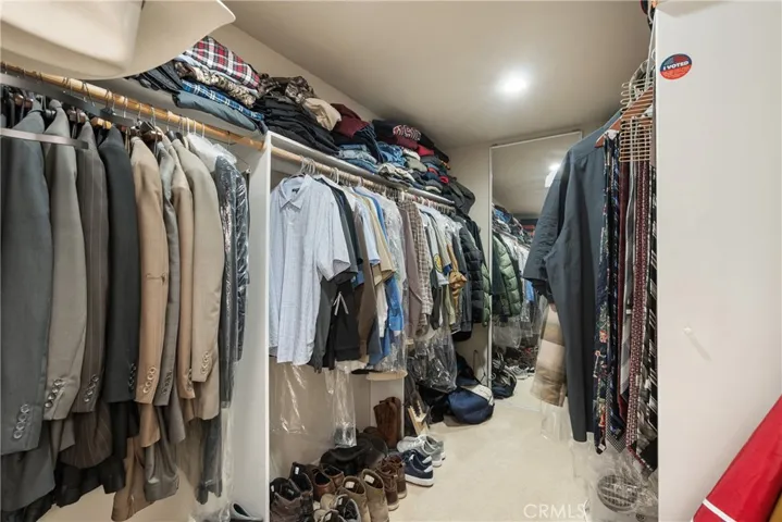 Primary room walk in closet