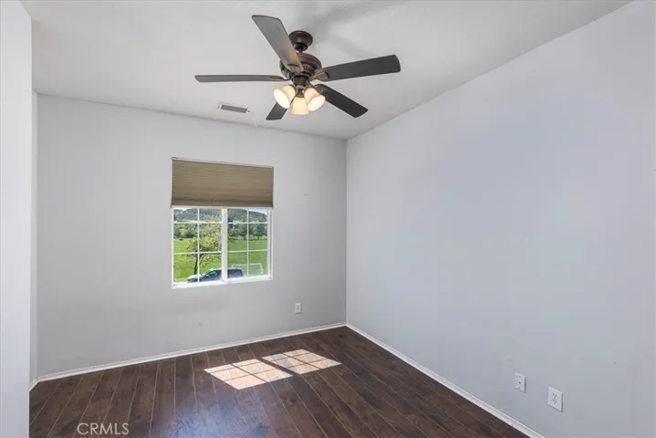 Downstairs bedroom. View of the park across the street.