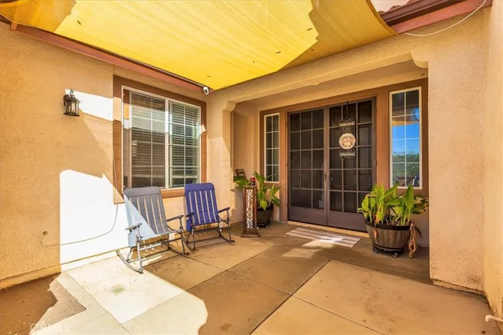 Front porch with double door entry into main 3417 sq. ft. home.
