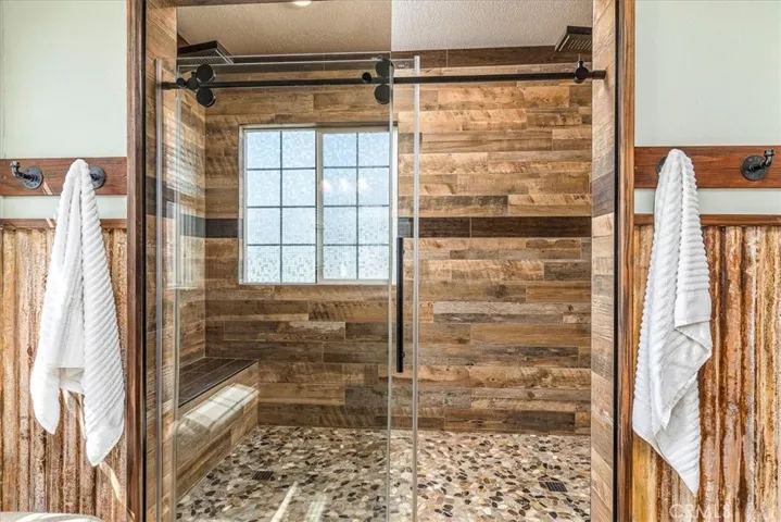 Stunning newly renovated shower.  Amazing shower head and features.  Must see.