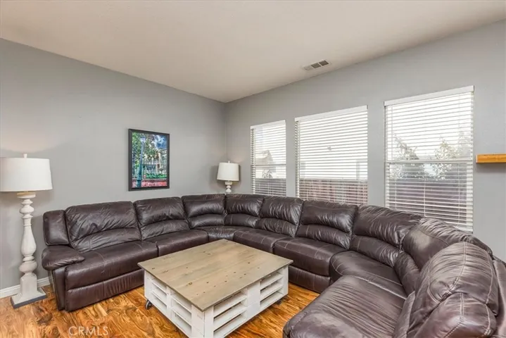 Living room/Bonus Room off of front entry.