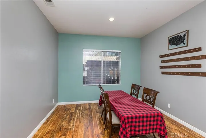Spacious dining area.  Door leads into adjoining kitchen.