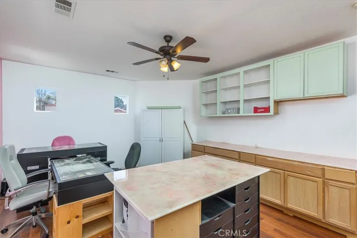 Another view of large bedroom/craft room.