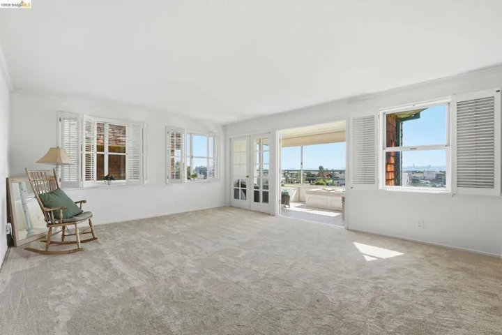 Unfurnished sunroom featuring french doors and healthy amount of natural light