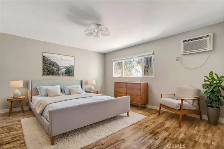 Primary bedroom. (Virtually enhanced).