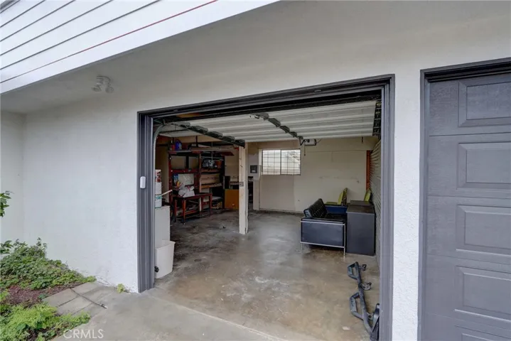 One and a half car garage with work bench and storage