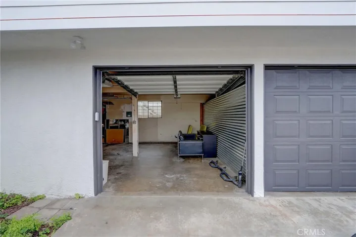 One and a half car garage with work bench and storage