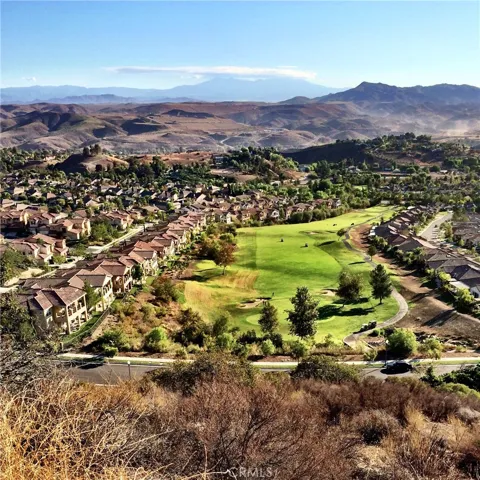 Glen Ivy's 13th Fairway with Condo Community at Left, Trilogy SFR's At Right