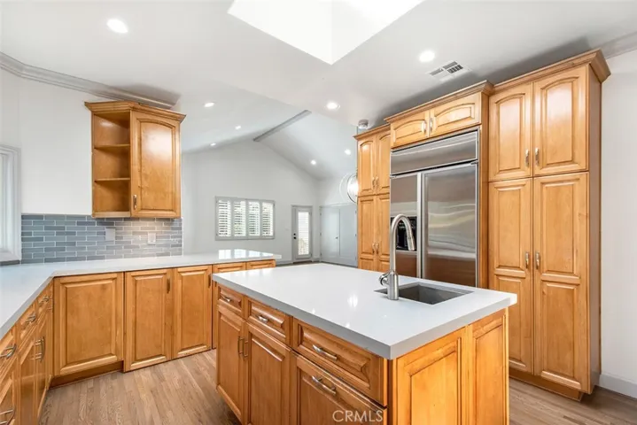 Different angel of Kitchen - Skylight and view into the Family Room