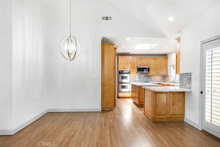 View from Family Room into the Dining Room and Kitchen - OPEN CONCEPT
