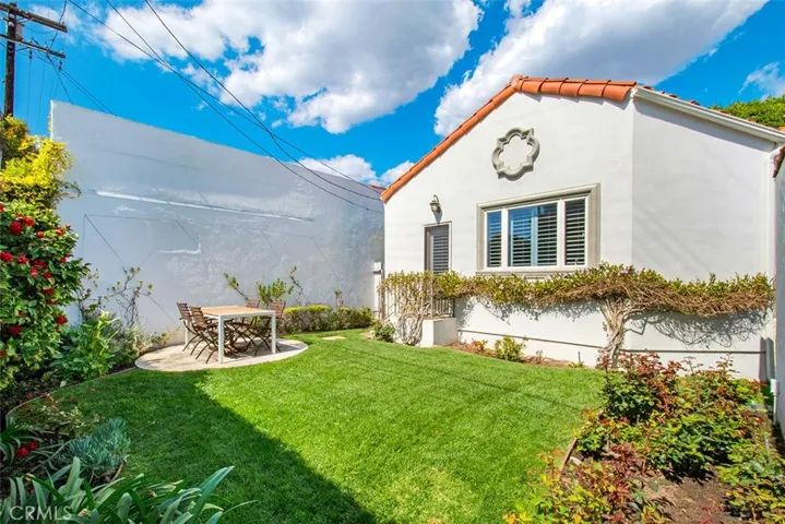 Backyard area with plenty of room for entertaining.  Back door entrance to Family Room.