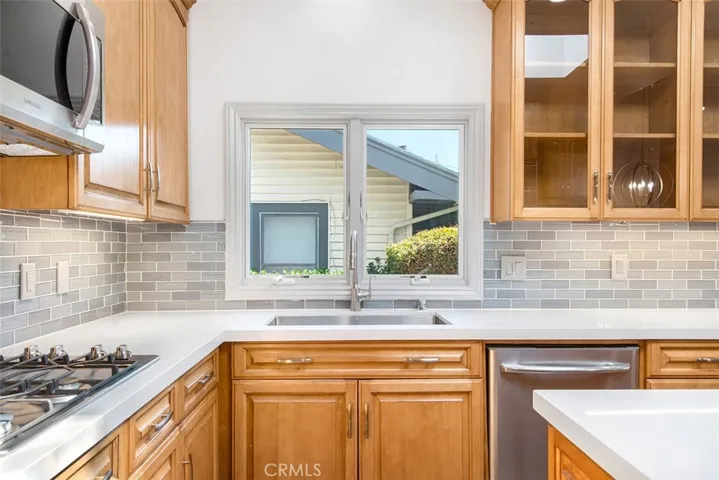 Kitchen view of window above sink and gorgeous "glass backsplash"