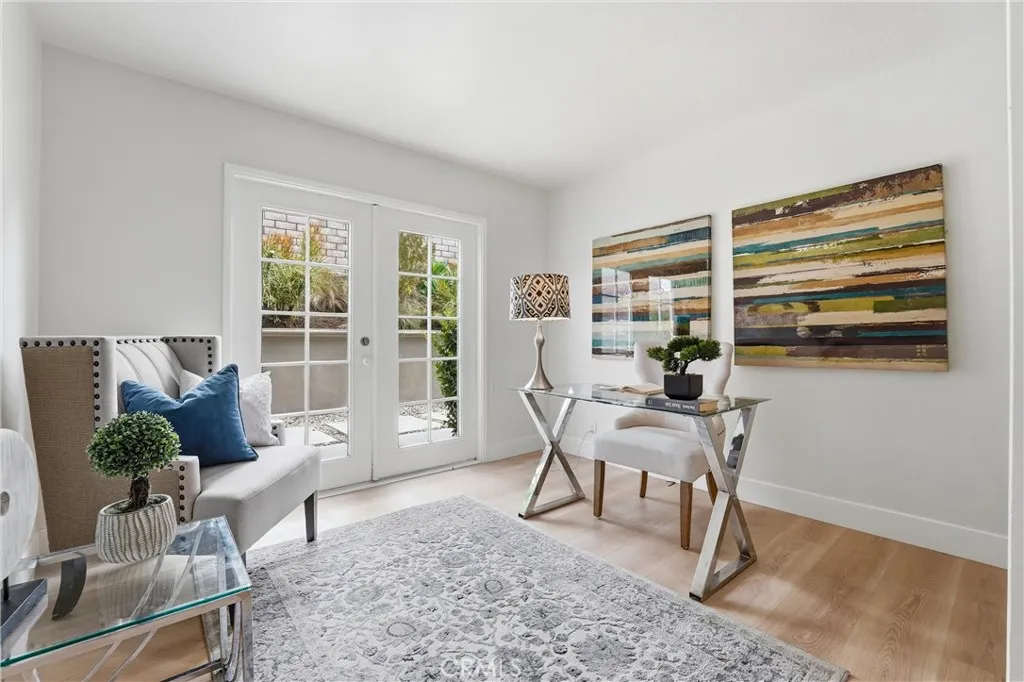 Main Floor Bedroom / Office has direct access to the side yard.