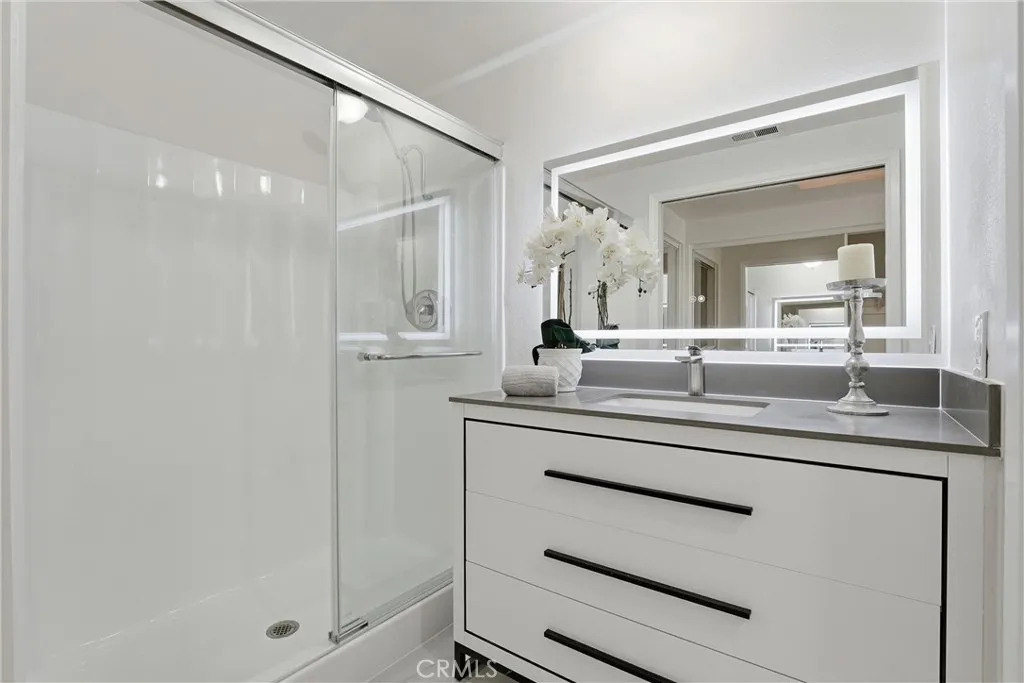 Primary Bathroom has standing shower as well.