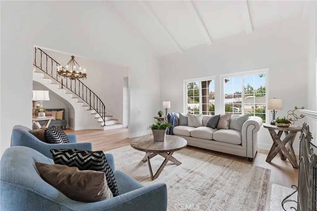 Living Room with plenty natural light and high ceilings.