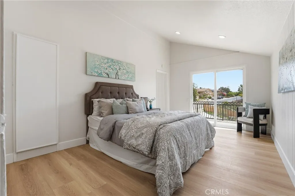 2nd bedroom on upper level has an retreat and a balcony with city light view.