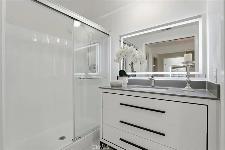 Primary Bathroom has standing shower as well.