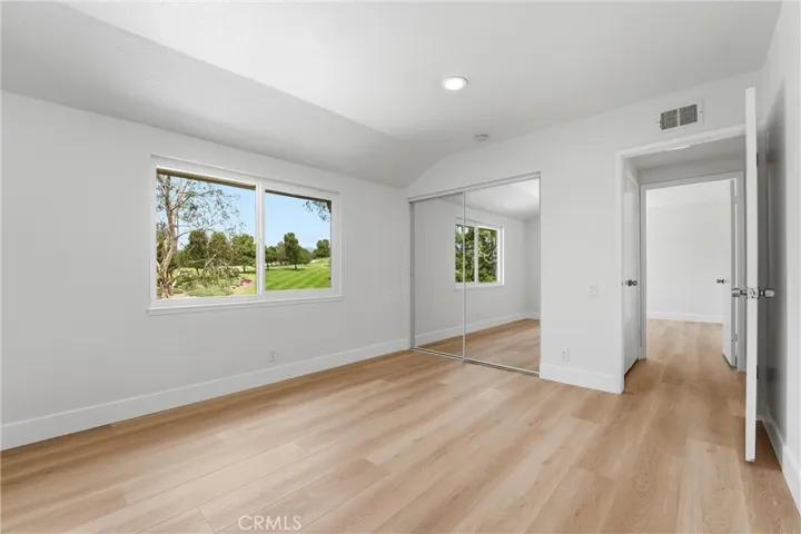4th bedroom also has brand new flooring, recessed lights, new closet doors and view of the golf course
