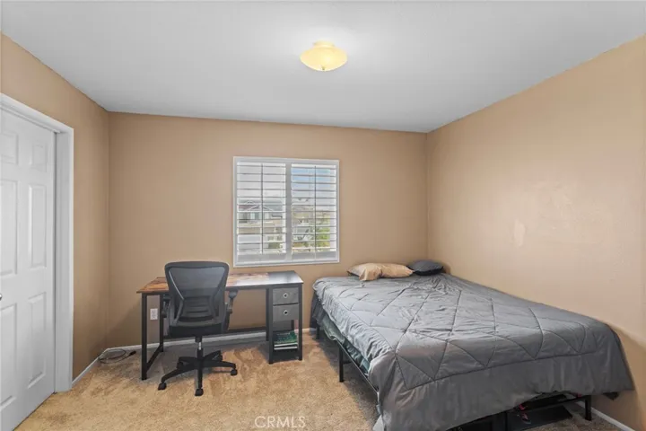 5th bedroom with walk-in closet & window