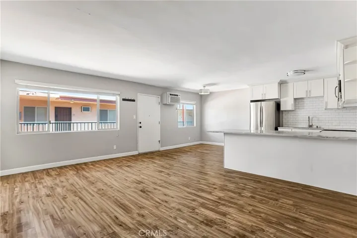 Living, dining, kitchen.