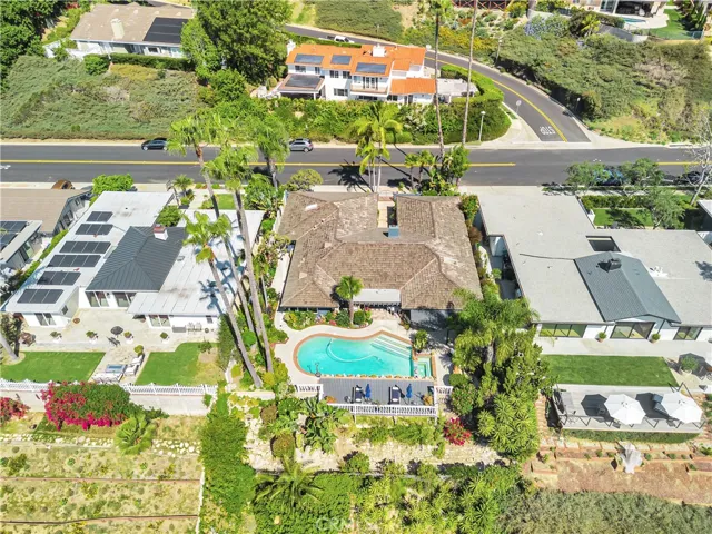 12,000 sq. ft. lot extends all the way down to street below.