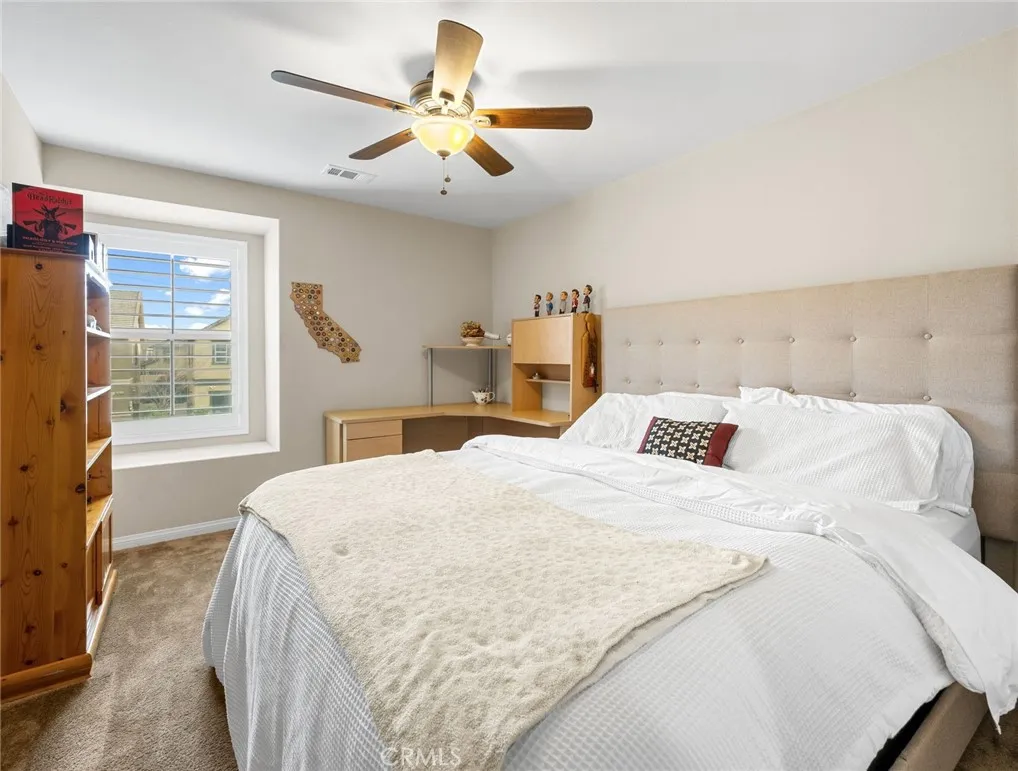 Secondary bedroom with walk-in closet
