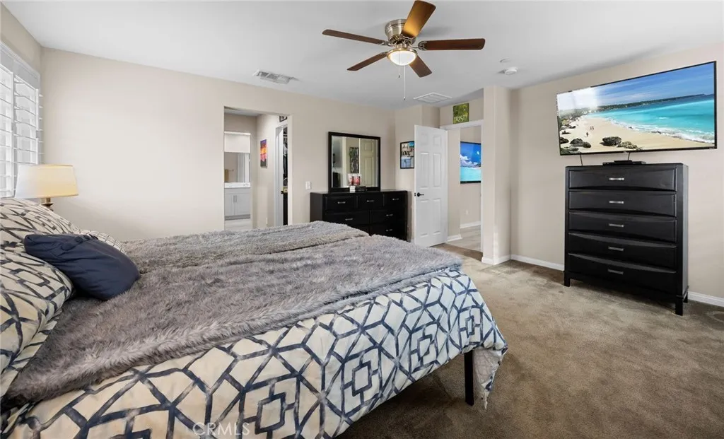 Primary bedroom with double walk-in closets