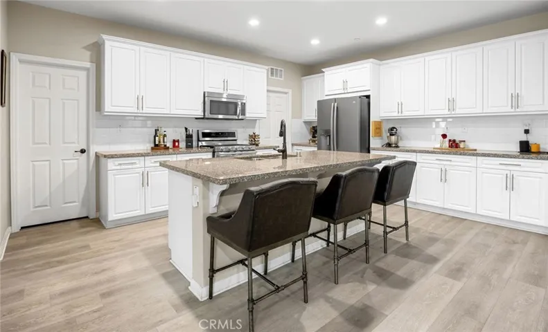 Kitchen area with quarts kitchen countertops