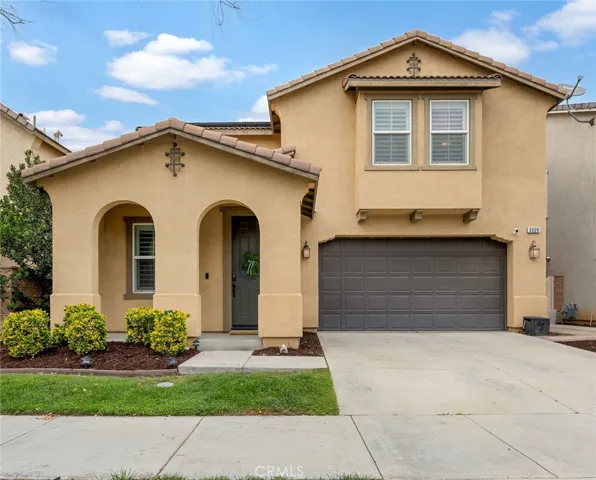 Two car garage with one step to the front entrance door