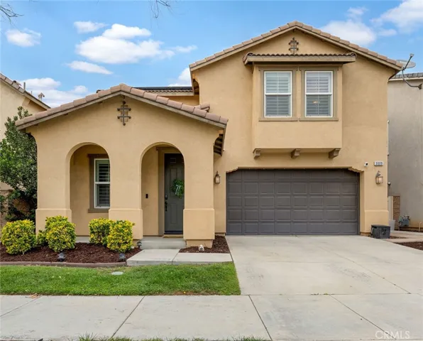 Two car garage with one step to the front entrance door