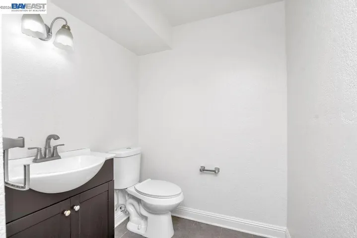 There is a full sized shower behind the door.