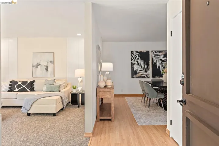Bedroom featuring recessed lighting, light wood finished floors, and a closet
