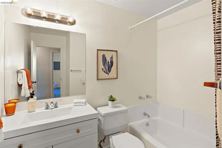 Full bathroom featuring vanity and shower / bath combination