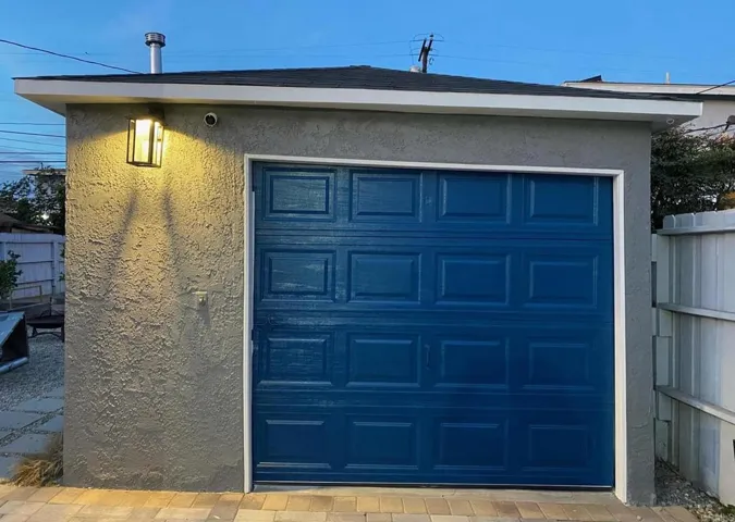 One car garage with laundry.