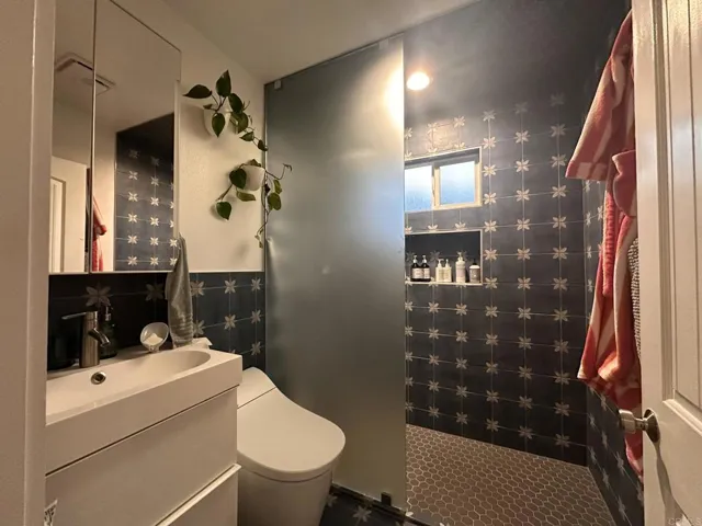 Newly remodeled bathroom with smart toilet and heated floors.