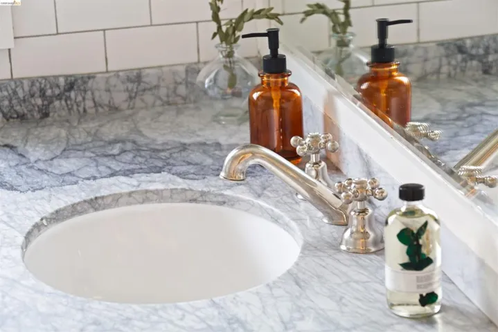 Gorgeous custom vanity with marble countertop.