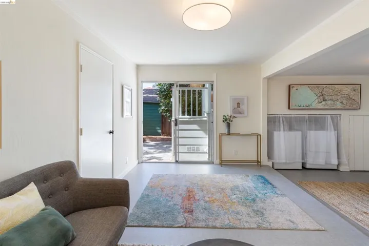 Lower level TV room opens out to the backyard.