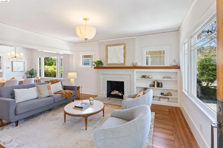 Living room features beautiful oak flooring.