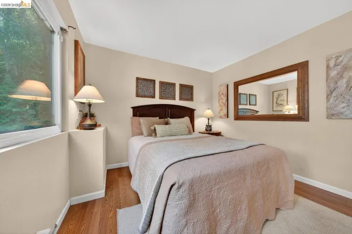 Bedroom featuring wood finished floors