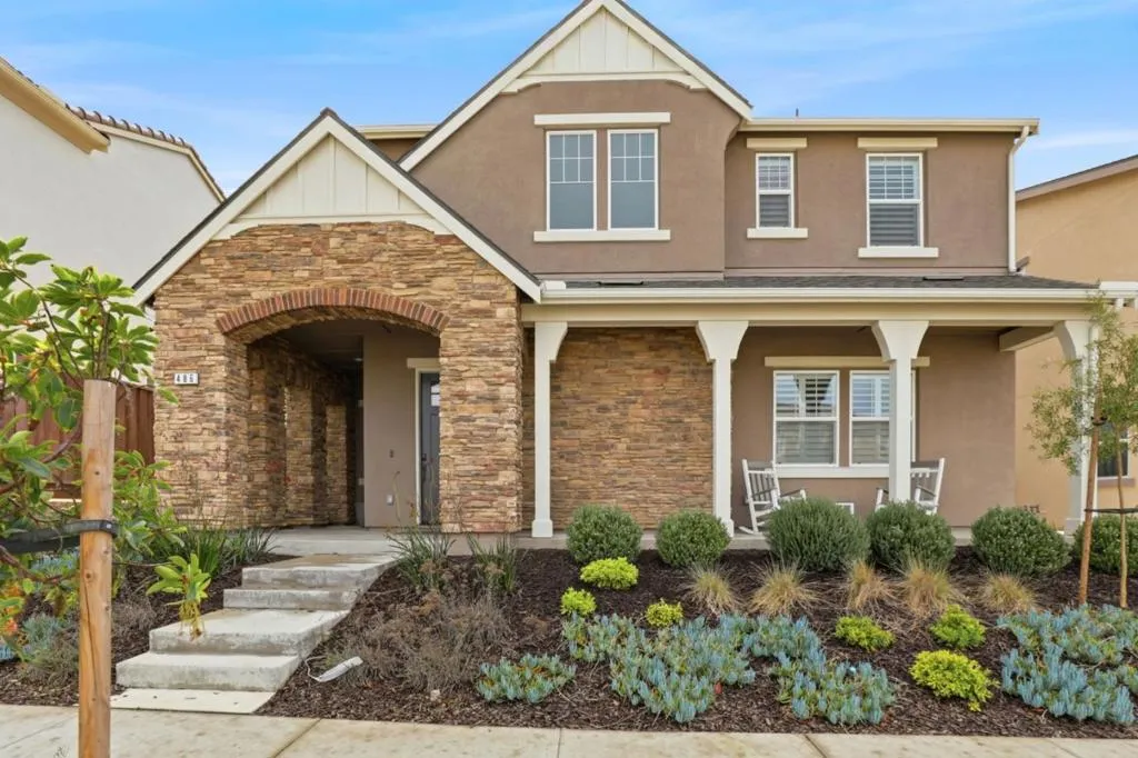 Spanish-style Trumark residence is gracefully positioned on a premium, elevated homesite.