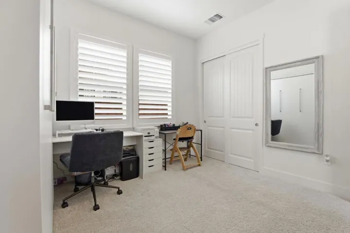 Bright and versatile room ideal for a home office, study, or guest space.