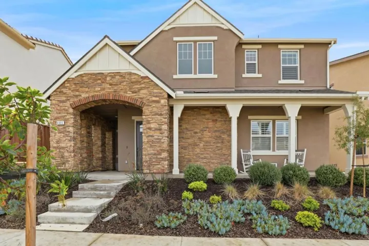 Spanish-style Trumark residence is gracefully positioned on a premium, elevated homesite.