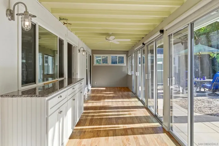 This is such a wonderful multipurpose room. Could be used for additional breakfast seating, use your imagination beautiful space.