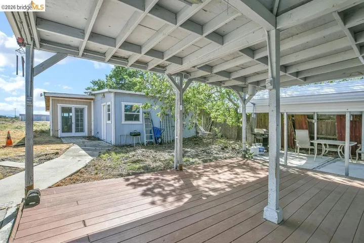 Deck featuring a grill and french doors